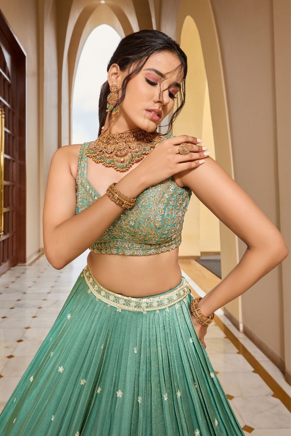 Sea green silk lehenga choli with thread embroidery and sequins work