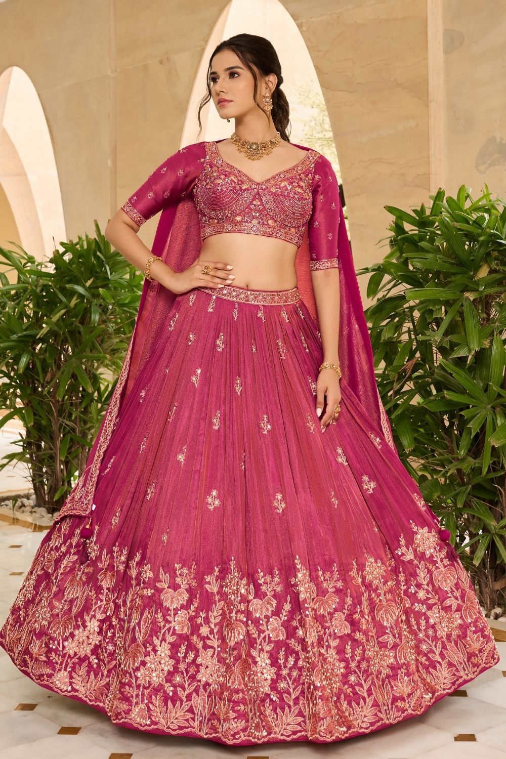 Dark fuchsia silk lehenga choli with sequins and thread work