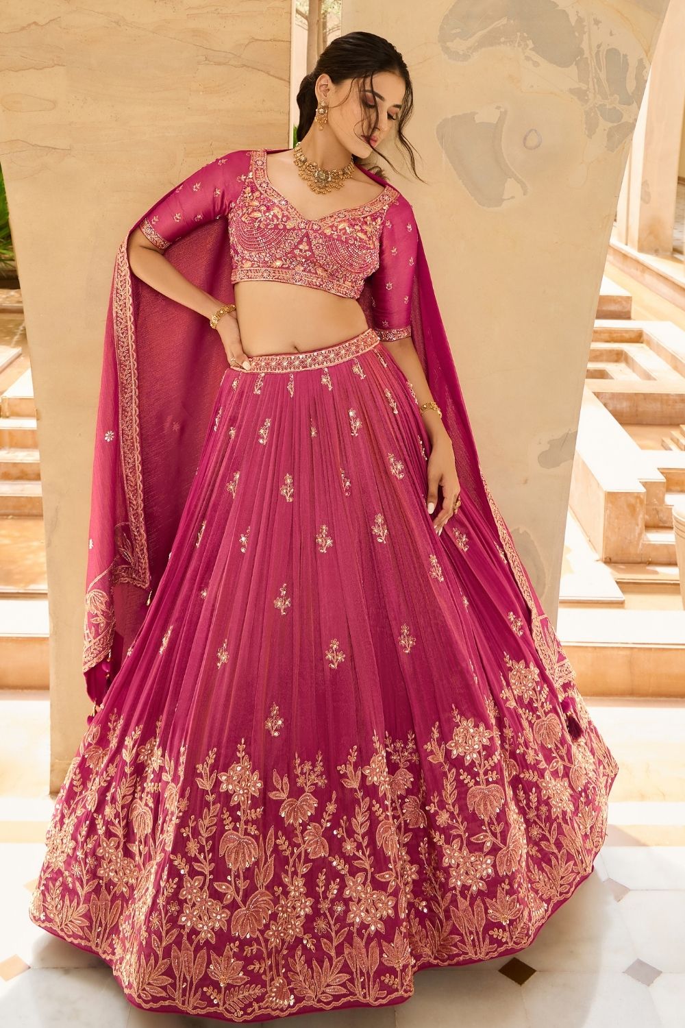 Dark fuchsia silk lehenga choli with sequins and thread work