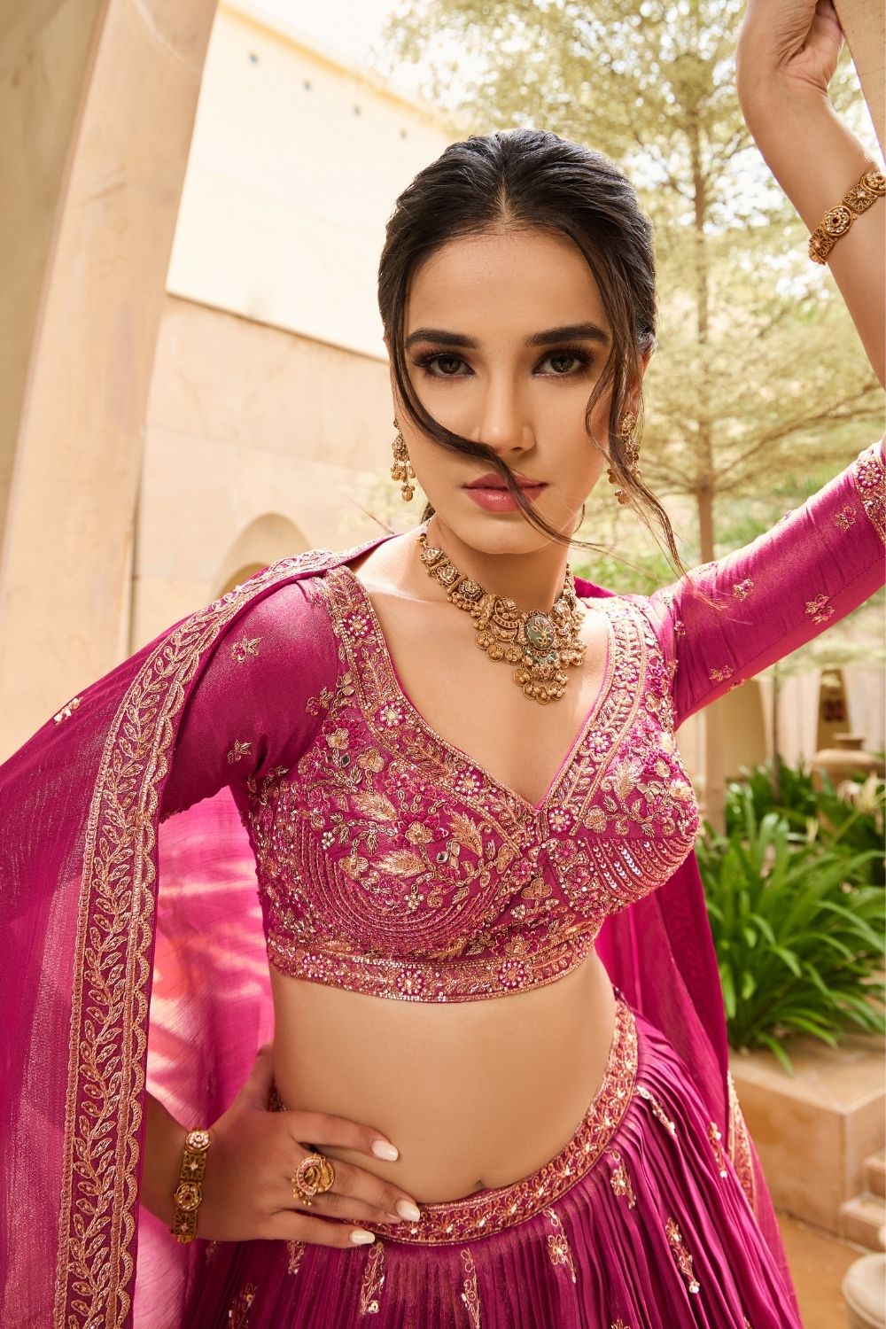 Dark fuchsia silk lehenga choli with sequins and thread work