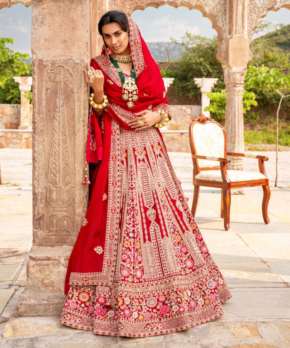 Red raw silk zardozi embroidered bridal lehenga choli with resham and sequin work