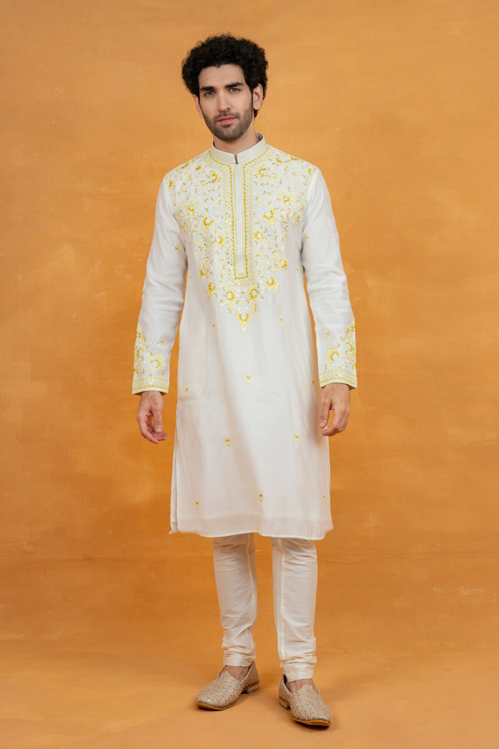 Silk kurta set with yellow resham embroidery and mirror work