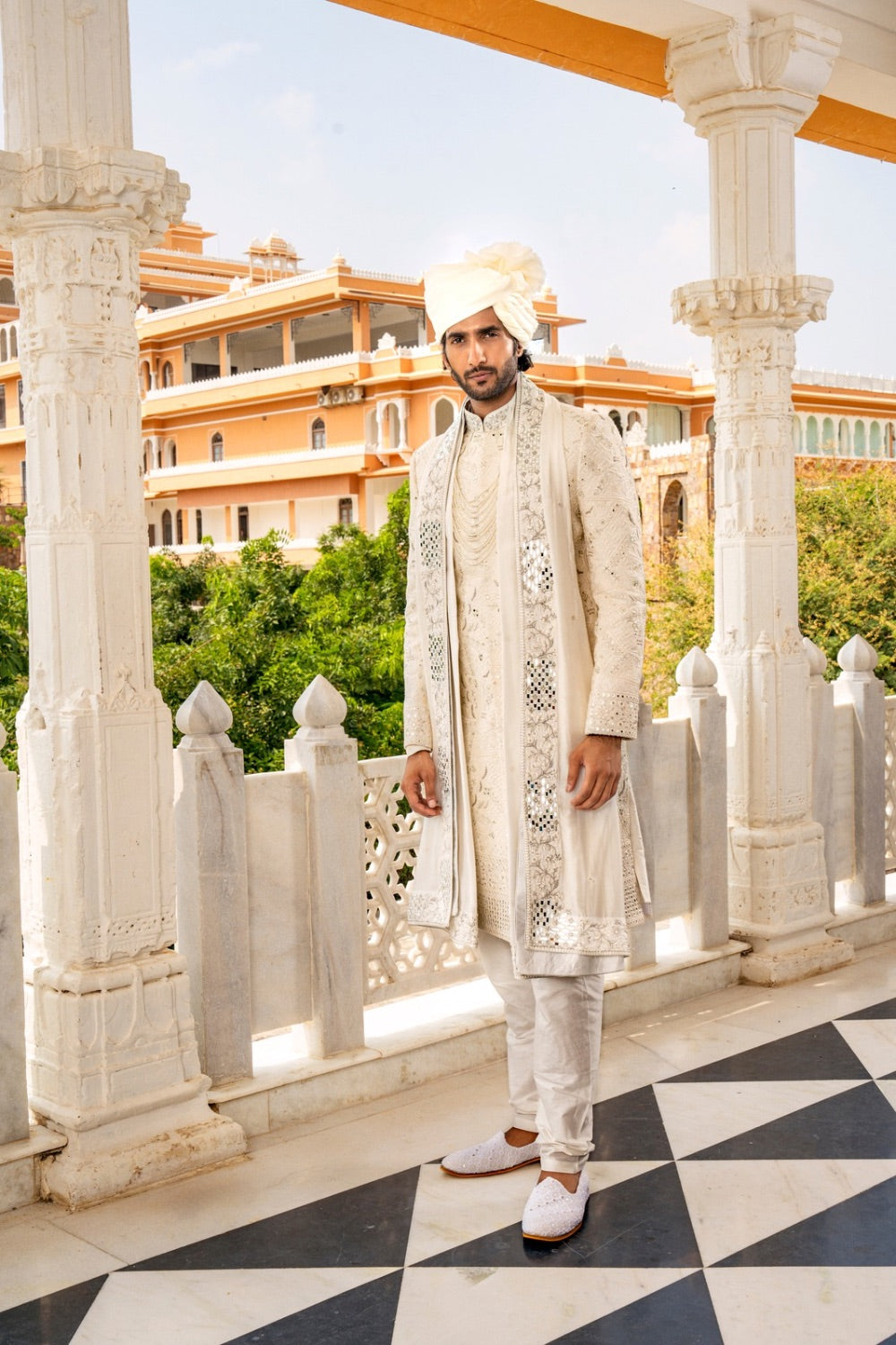Ivory silk sherwani with thread and mirror work