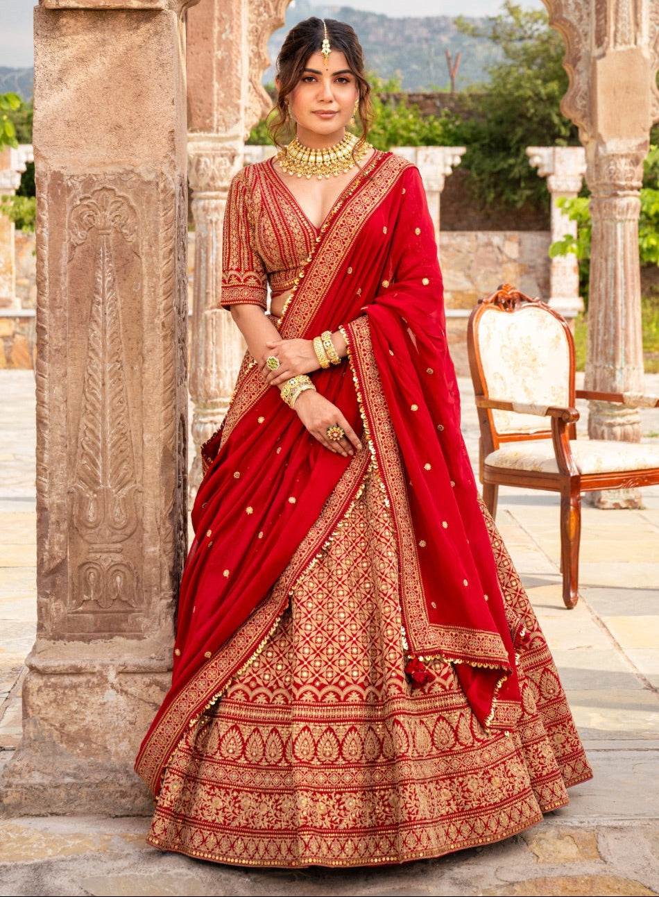 Cherry red raw silk bridal lehenga choli with marodi work
