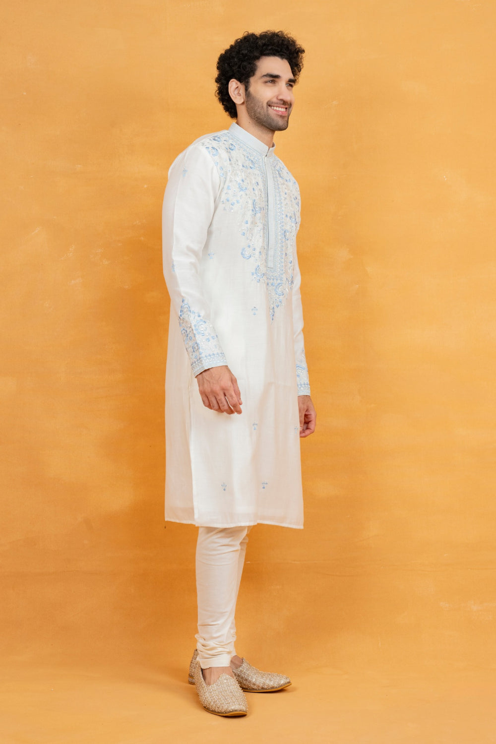 Silk kurta set with yellow resham embroidery and mirror work