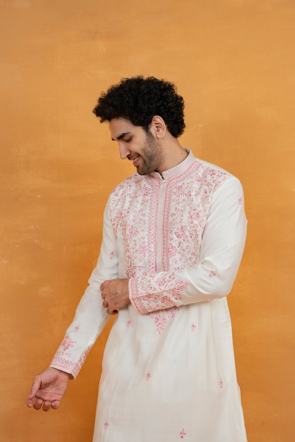 Silk kurta set with yellow resham embroidery and mirror work