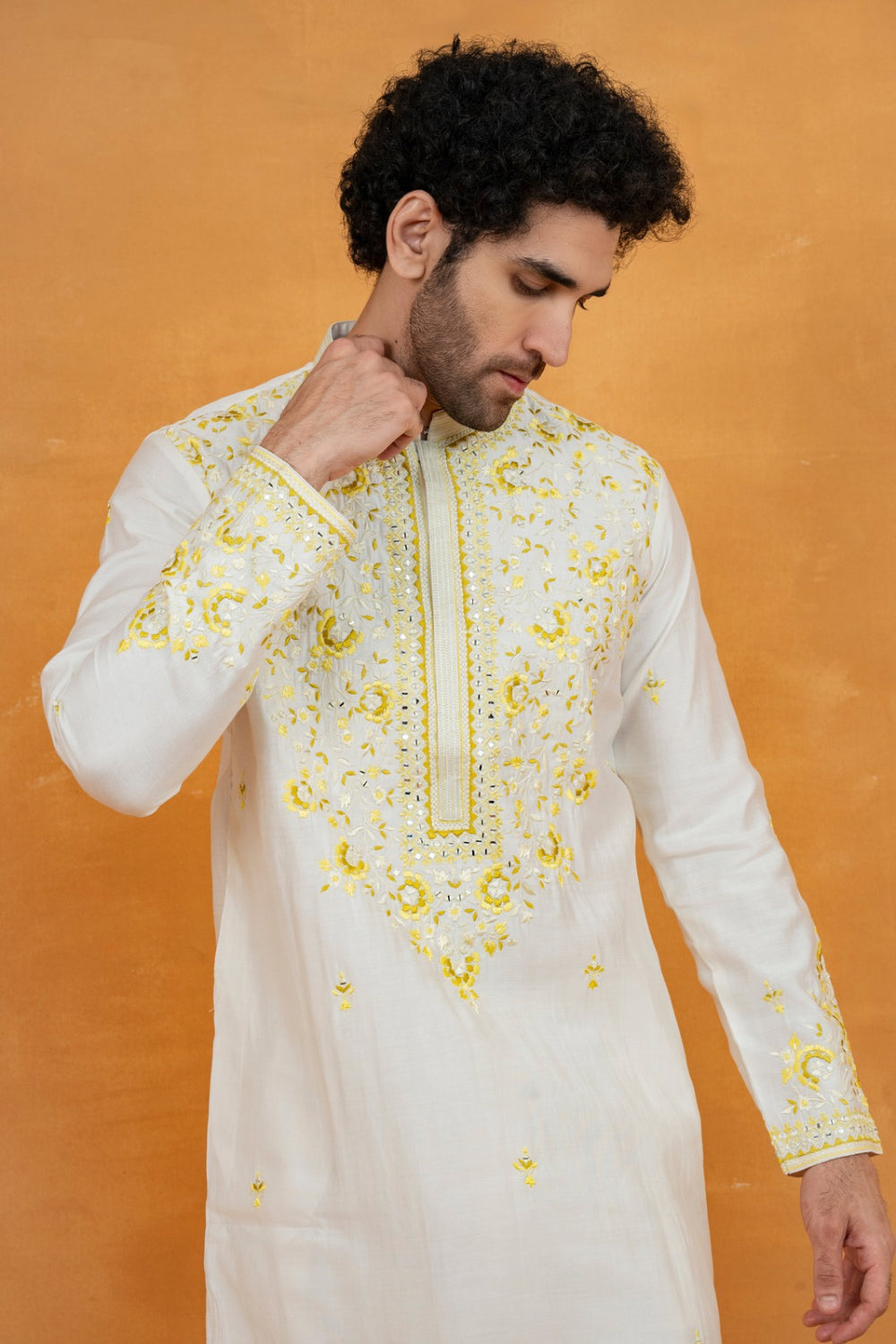 Silk kurta set with yellow resham embroidery and mirror work