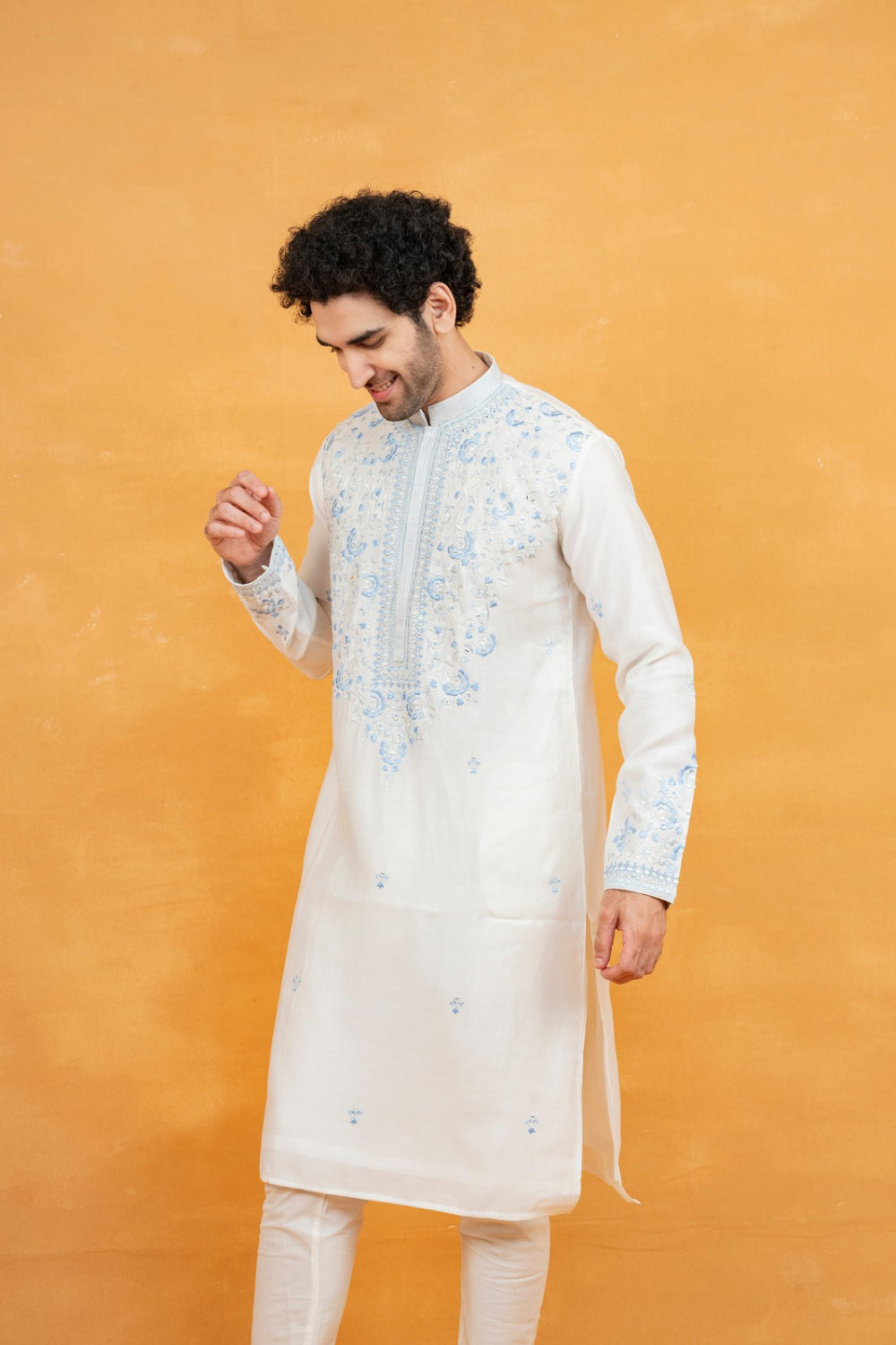 Silk kurta set with yellow resham embroidery and mirror work