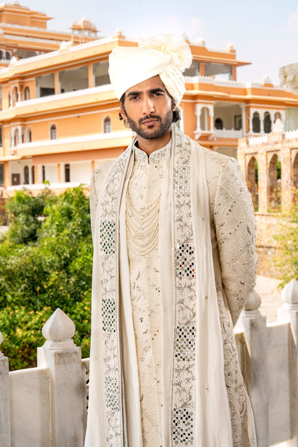 Ivory silk sherwani with thread and mirror work