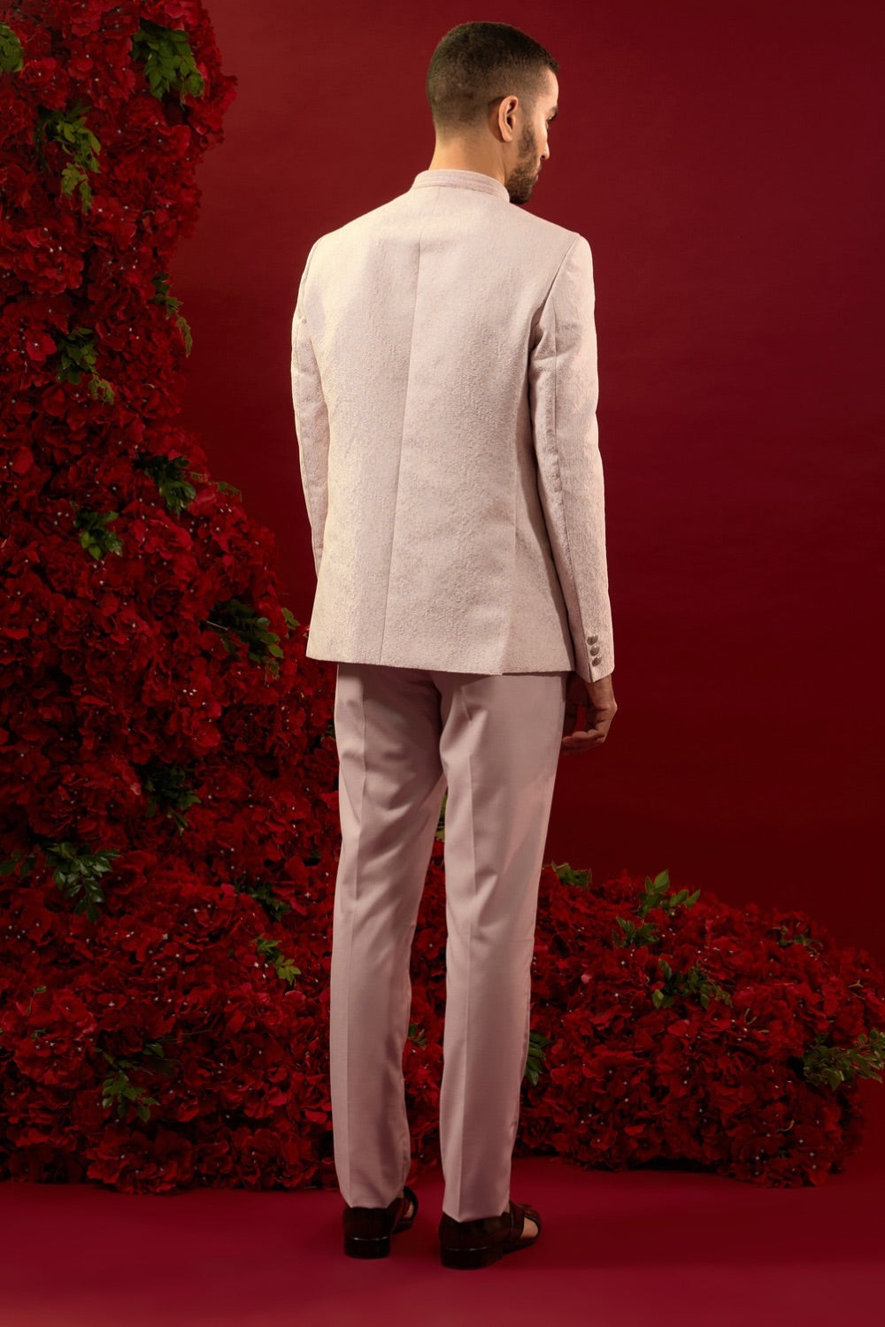 Silk suit with hand work on neckline and pocket