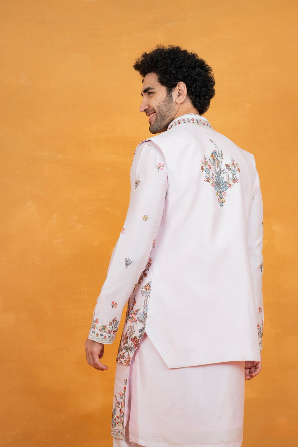 Light pink silk open koti set with multicolour floral thread embroidery