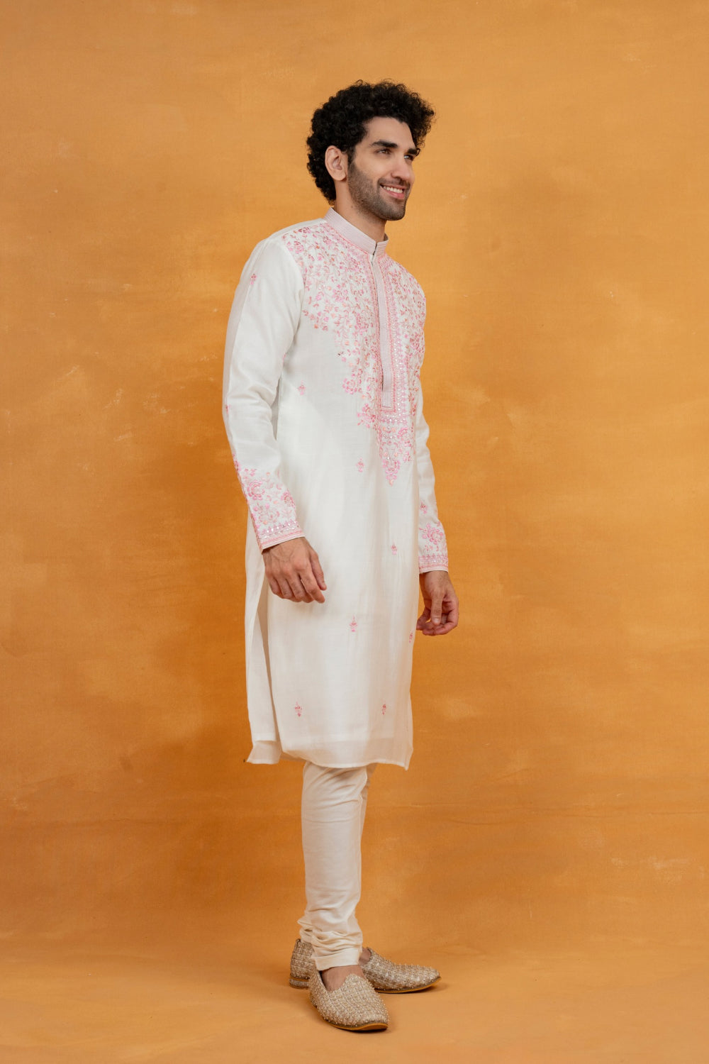 Silk kurta set with yellow resham embroidery and mirror work