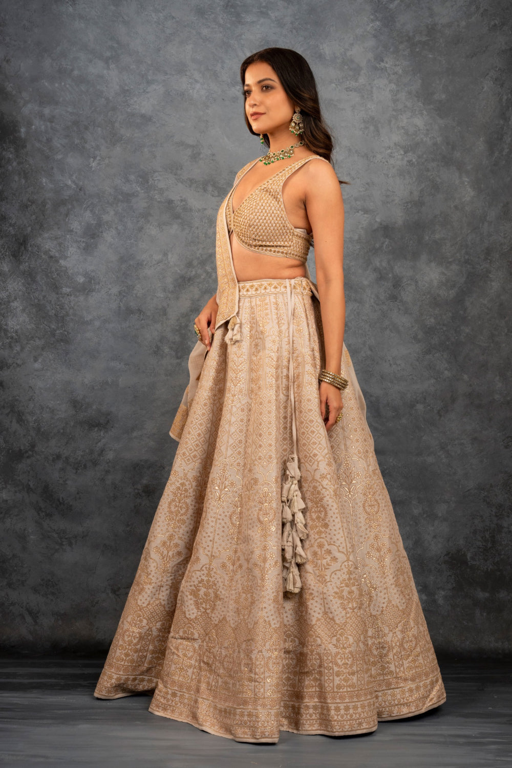 Beige banarasi silk lehenga choli with sequins hand cut dana and dori work