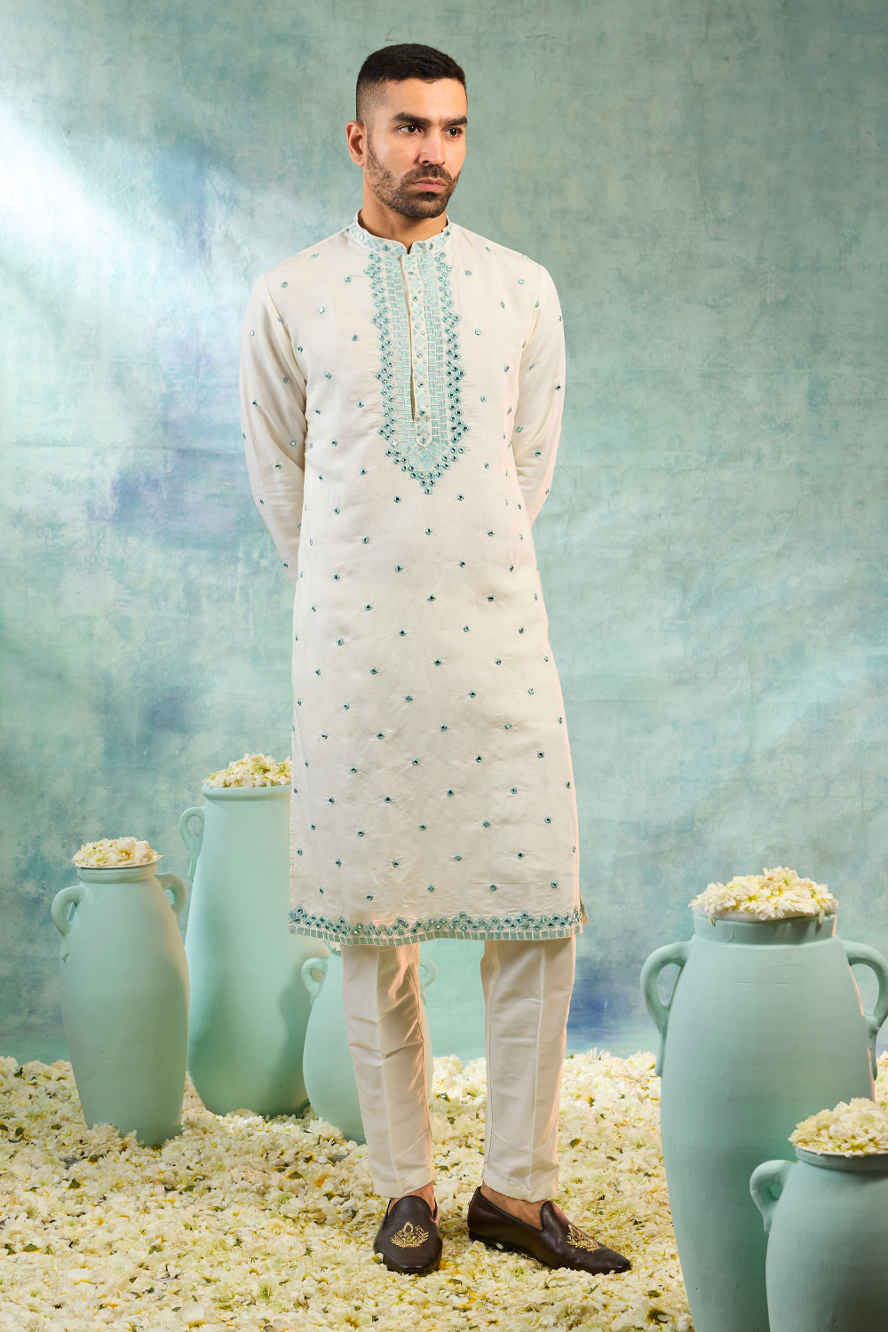 Pearl white kurta set with mint coloured thread work and mirror work