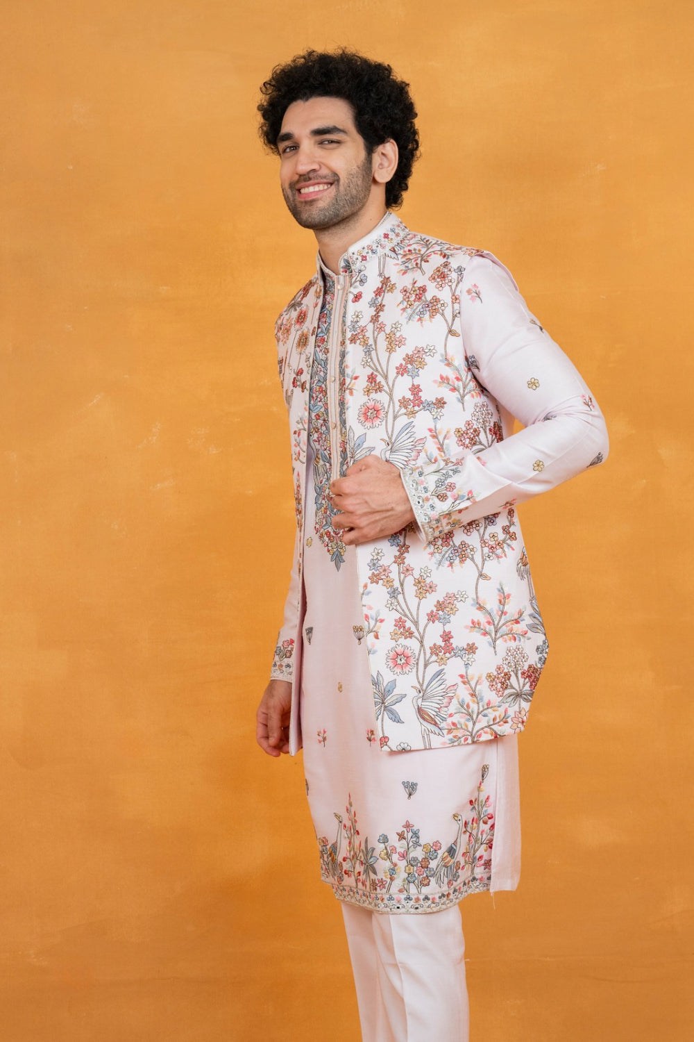Light pink silk open koti set with multicolour floral thread embroidery