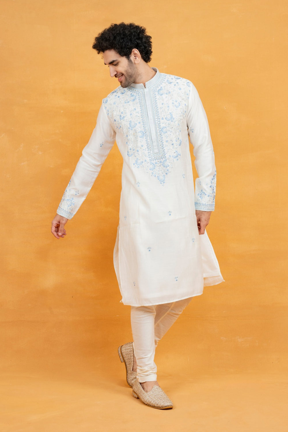 Silk kurta set with yellow resham embroidery and mirror work