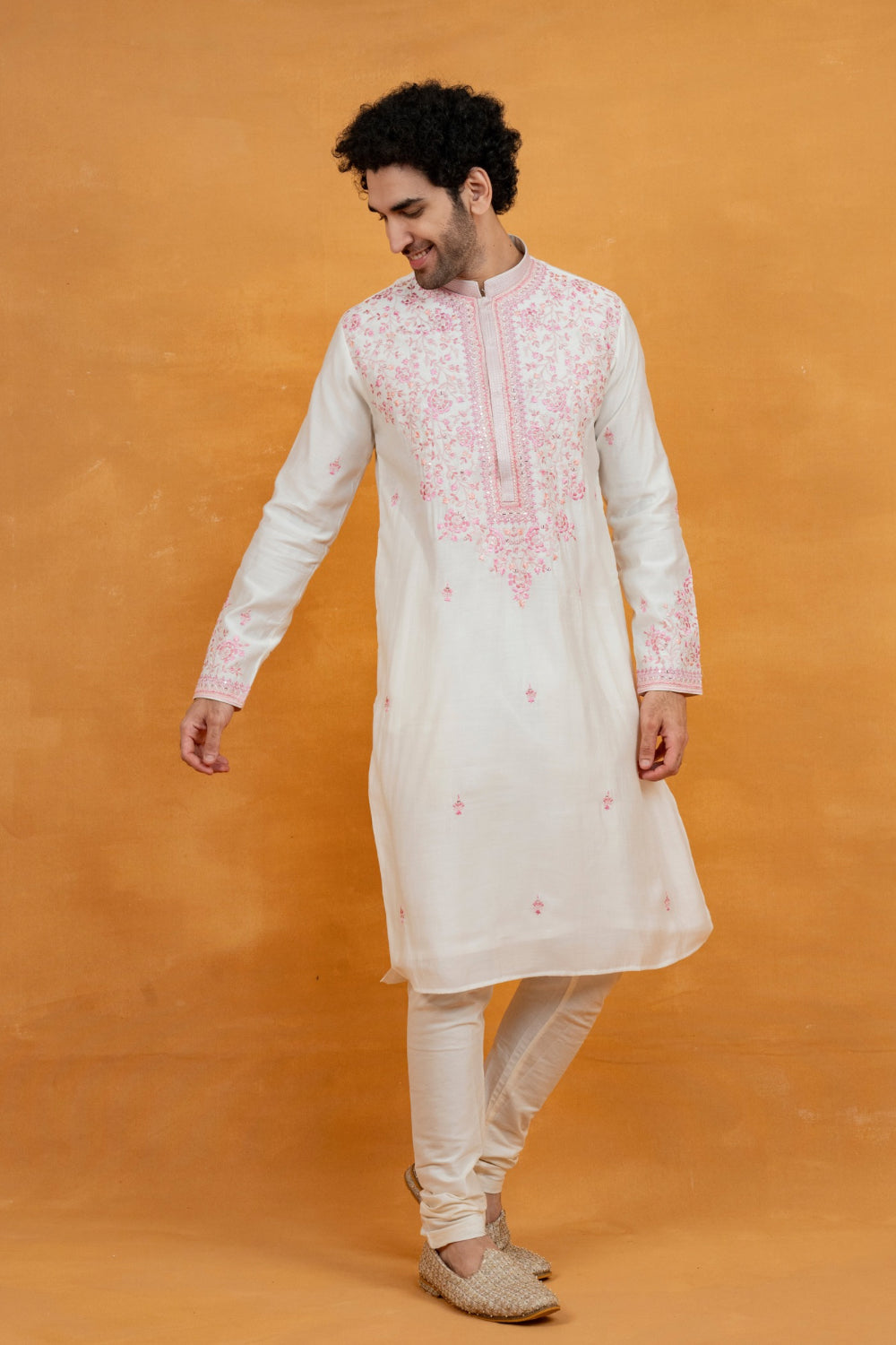 Silk kurta set with yellow resham embroidery and mirror work