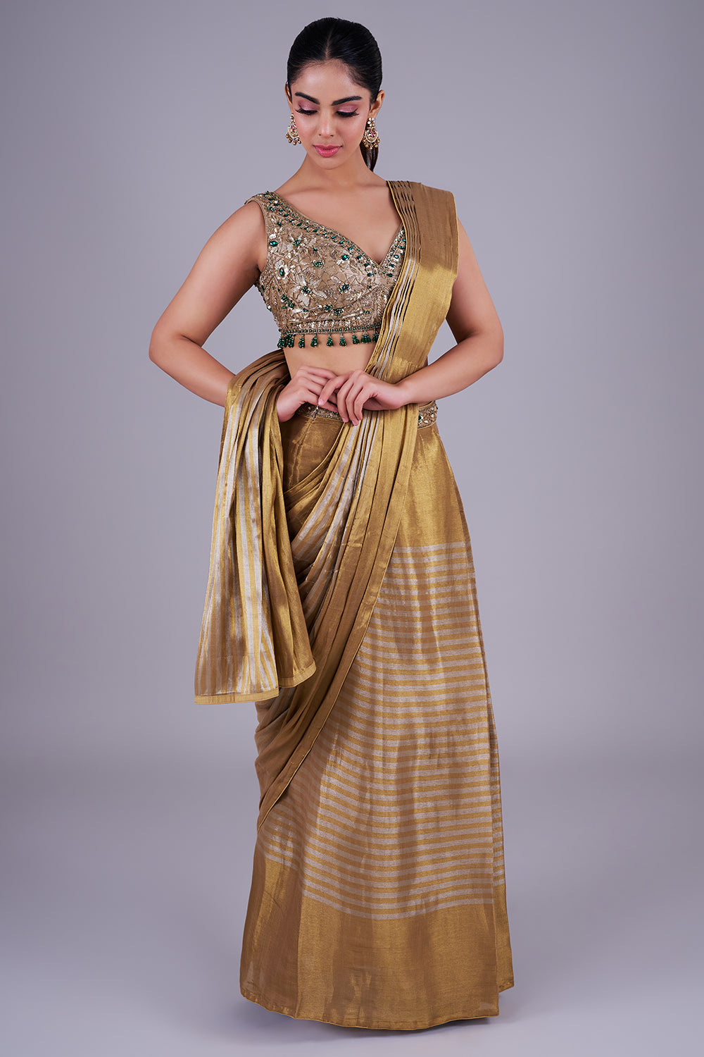 Antique gold drape with emerald blouse