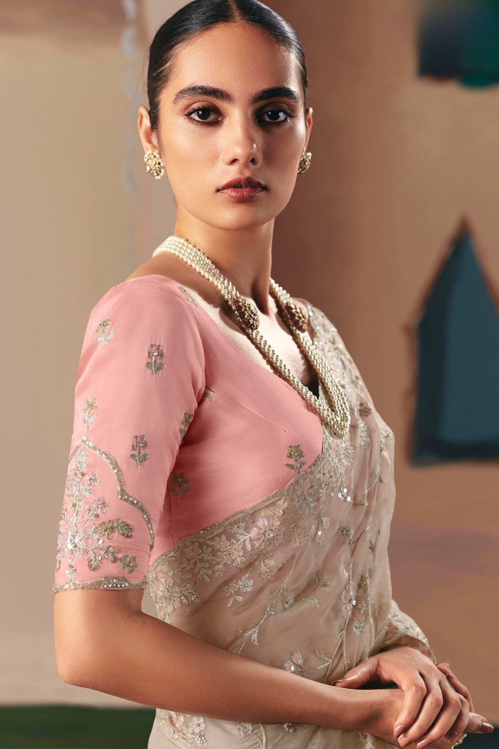 BEIGE ORGANZA SAREE WITH STONE AND RESHAM EMBROIDERY