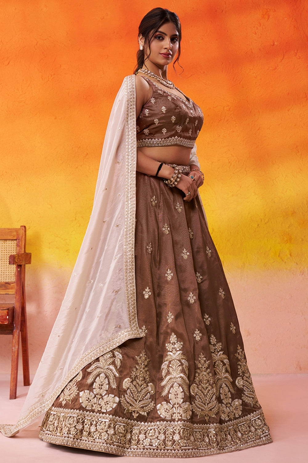 BROWN TISSUE LEHENGA CHOLI WITH MOTI AND RESHAM EMBROIDERY