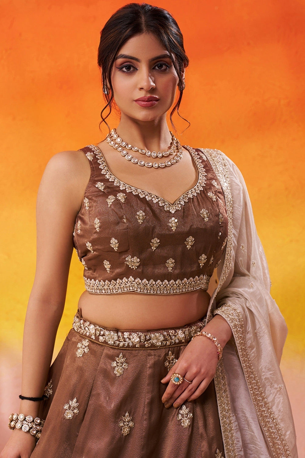 BROWN TISSUE LEHENGA CHOLI WITH MOTI AND RESHAM EMBROIDERY