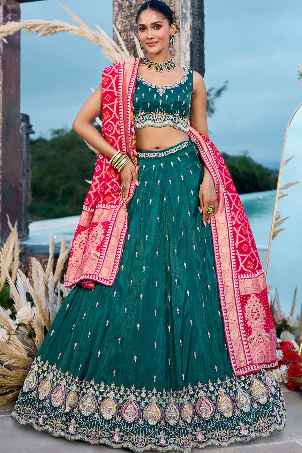 DARK GREEN SILK LEHENGA CHOLI WITH RESHAM EMBROIDERY AND CUTDANA