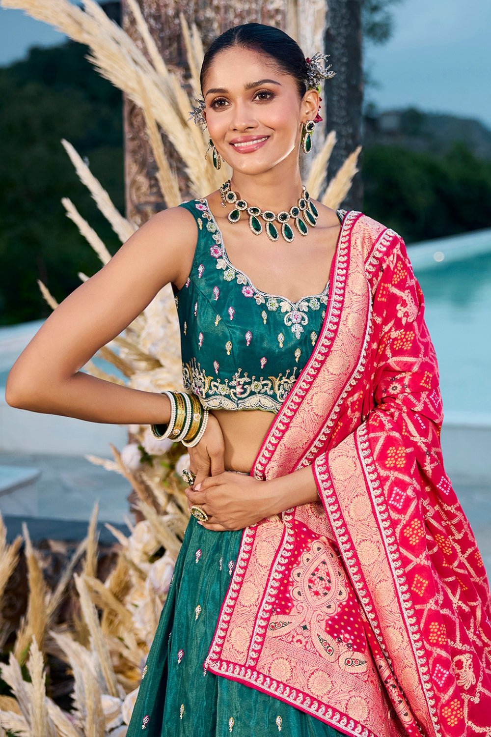 DARK GREEN SILK LEHENGA CHOLI WITH RESHAM EMBROIDERY AND CUTDANA