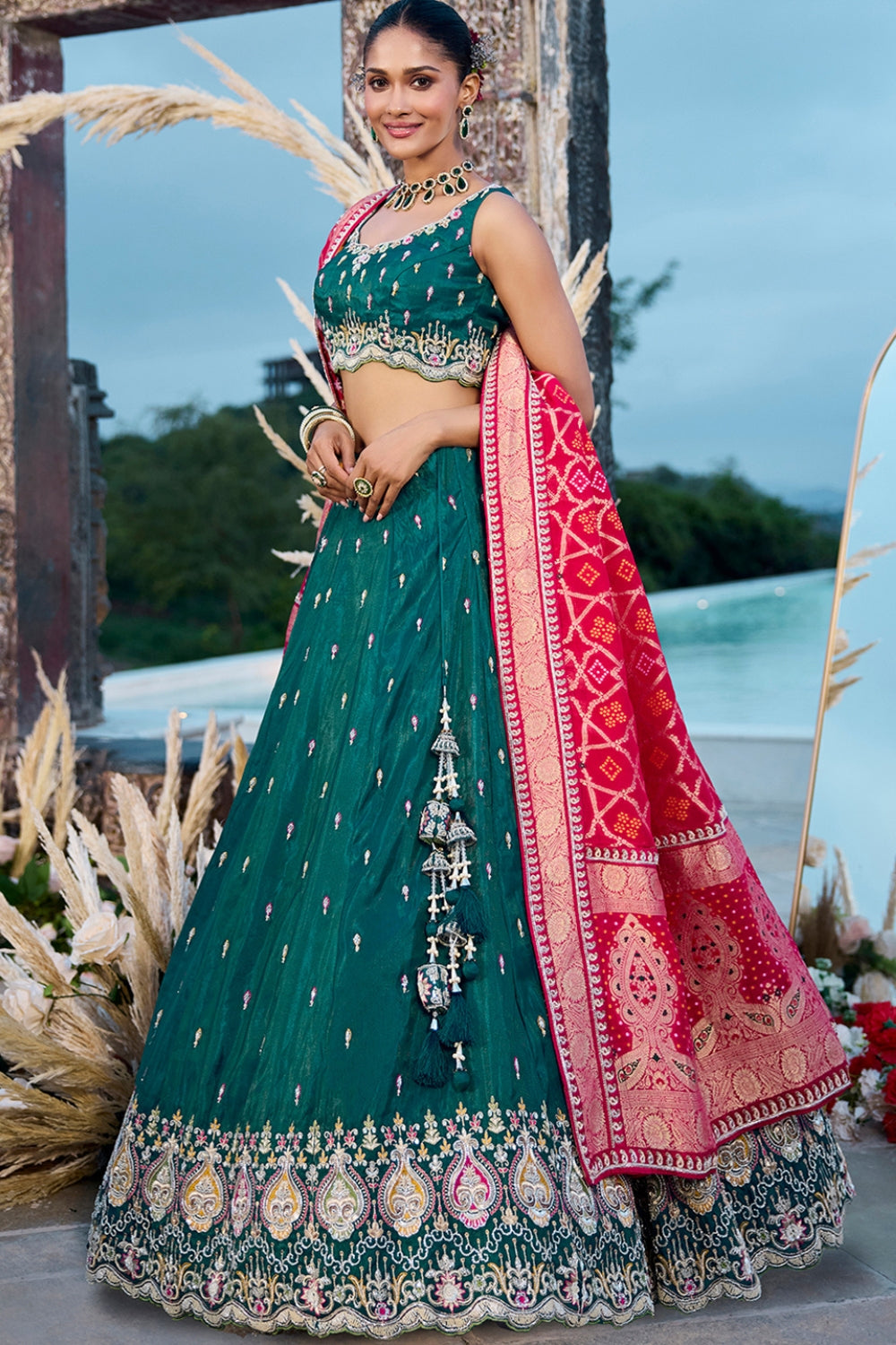 DARK GREEN SILK LEHENGA CHOLI WITH RESHAM EMBROIDERY AND CUTDANA