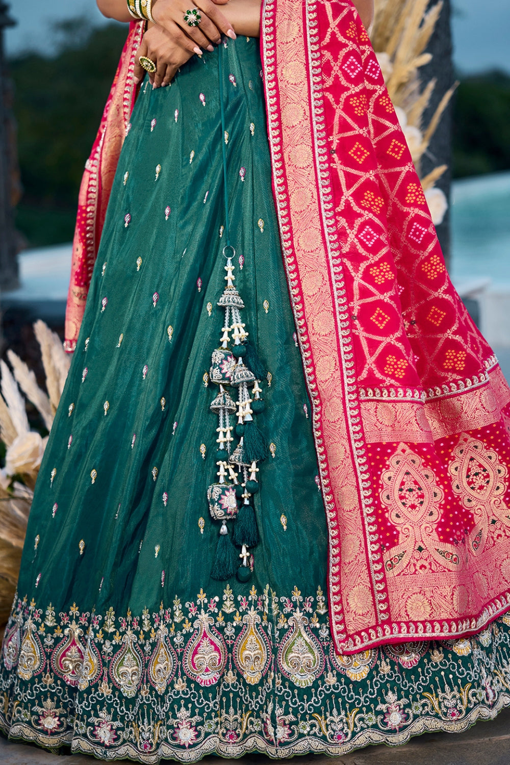 DARK GREEN SILK LEHENGA CHOLI WITH RESHAM EMBROIDERY AND CUTDANA