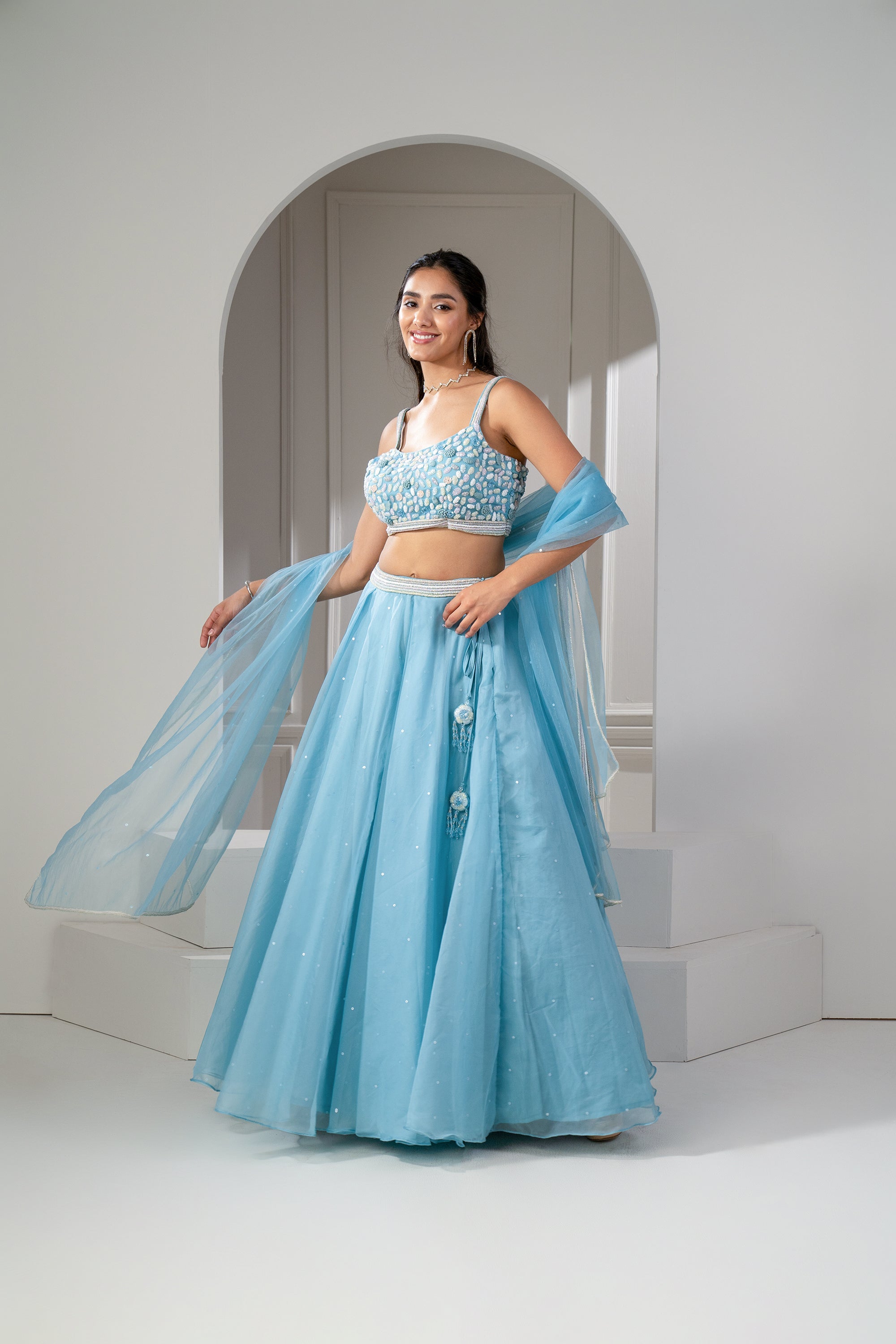 Frost Blue Organza Sequinned Lehenga Set.