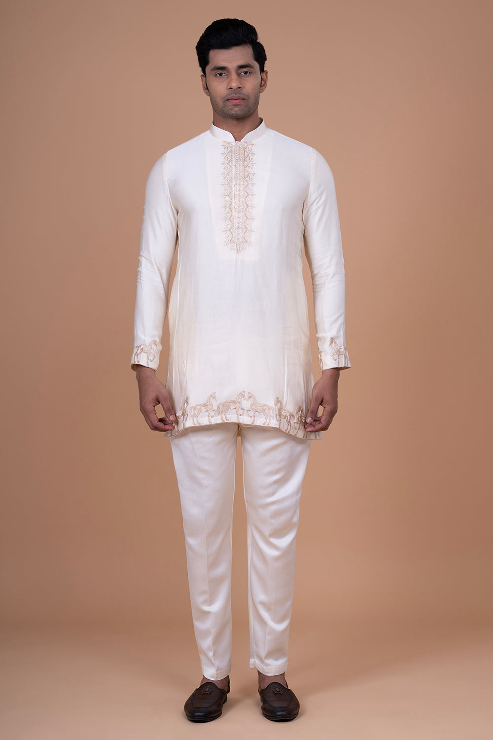 Ivory Raw Silk Sleeveless Bundi Jacket with Gold Zari Horse Embroidery.