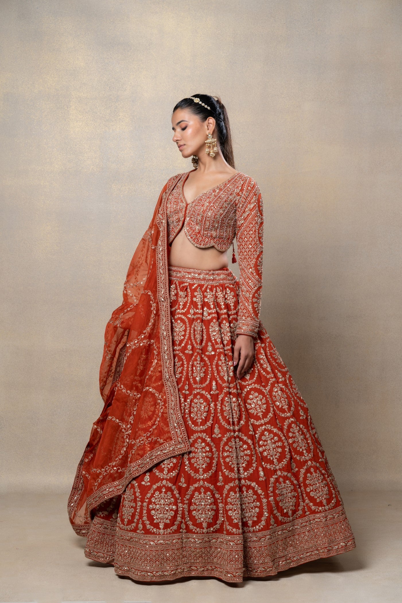 Mustard heavily embellished georgette organza lehenga set