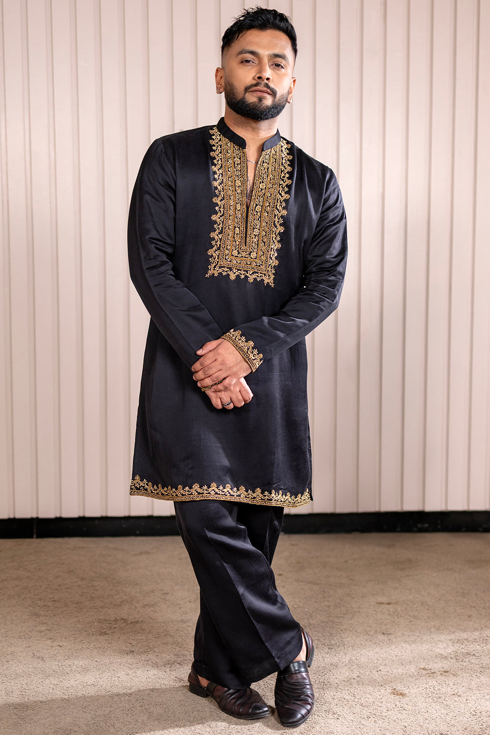 Jet Black Silk Kurta Pajama with Intricate Gold Zari Neckline & Border Work.