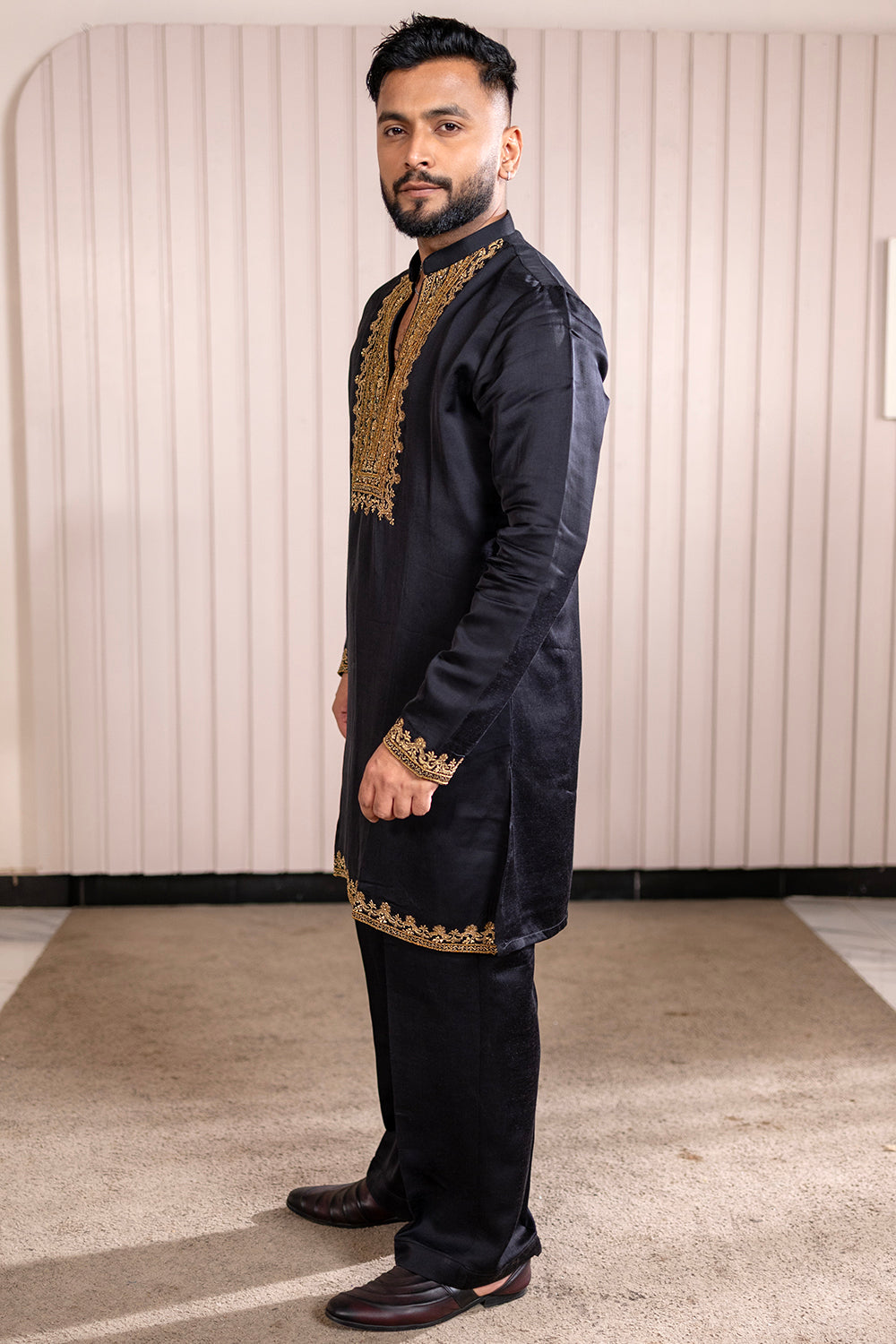 Jet Black Silk Kurta Pajama with Intricate Gold Zari Neckline & Border Work.