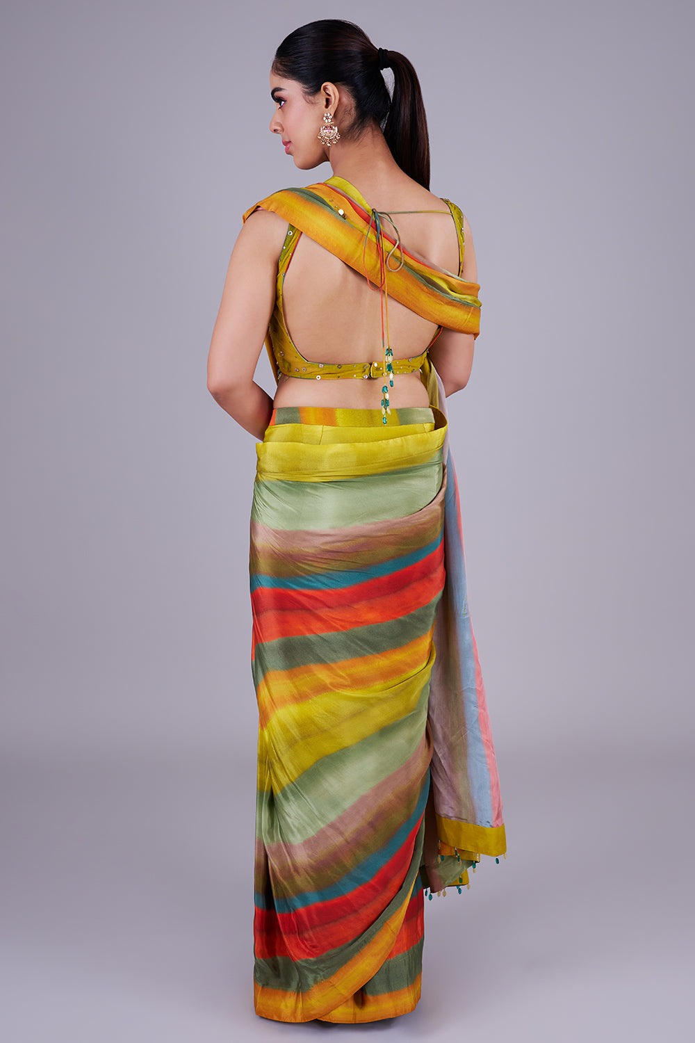 Multi-striped saree with sequin blouse