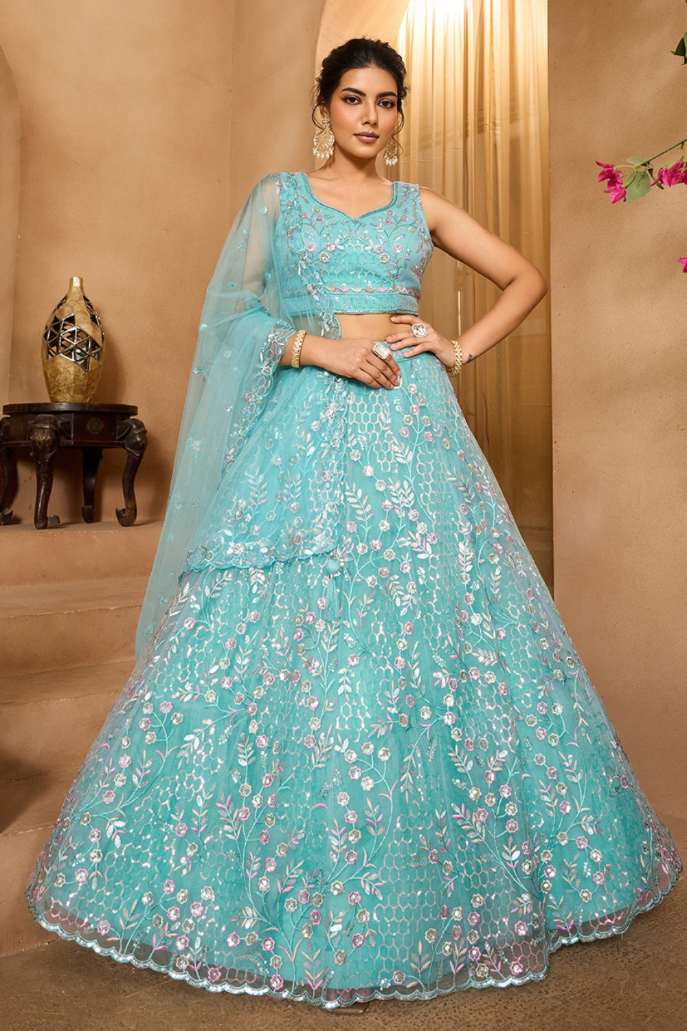 NET LEHENGA CHOLI WITH SEQUINS AND RESHAM EMBROIDERY