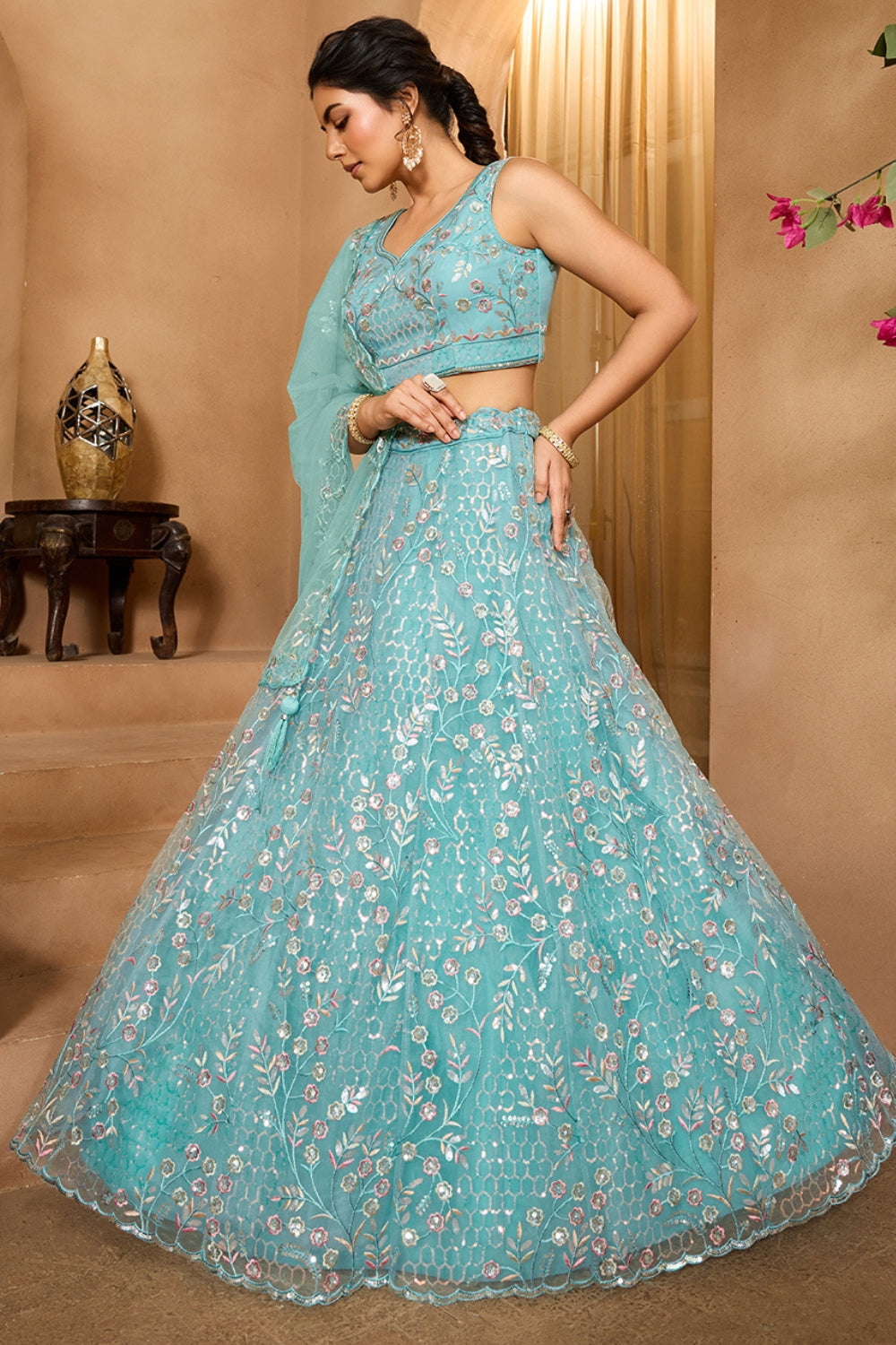 NET LEHENGA CHOLI WITH SEQUINS AND RESHAM EMBROIDERY