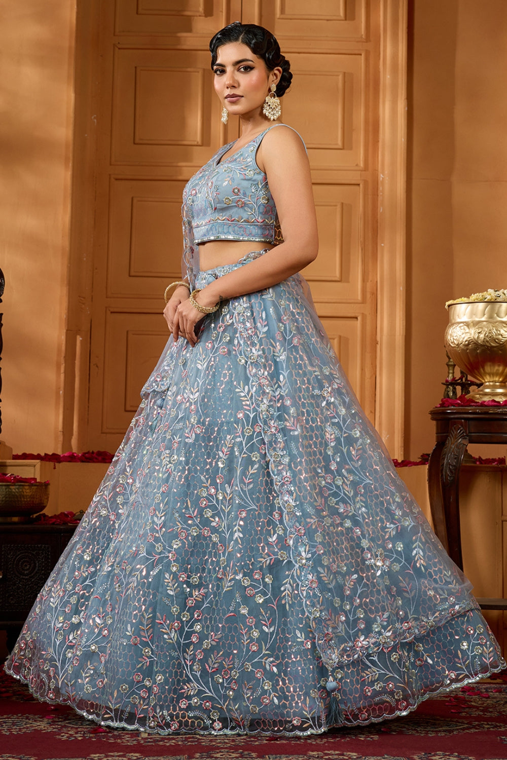 NET LEHENGA CHOLI WITH SEQUINS AND RESHAM EMBROIDERY