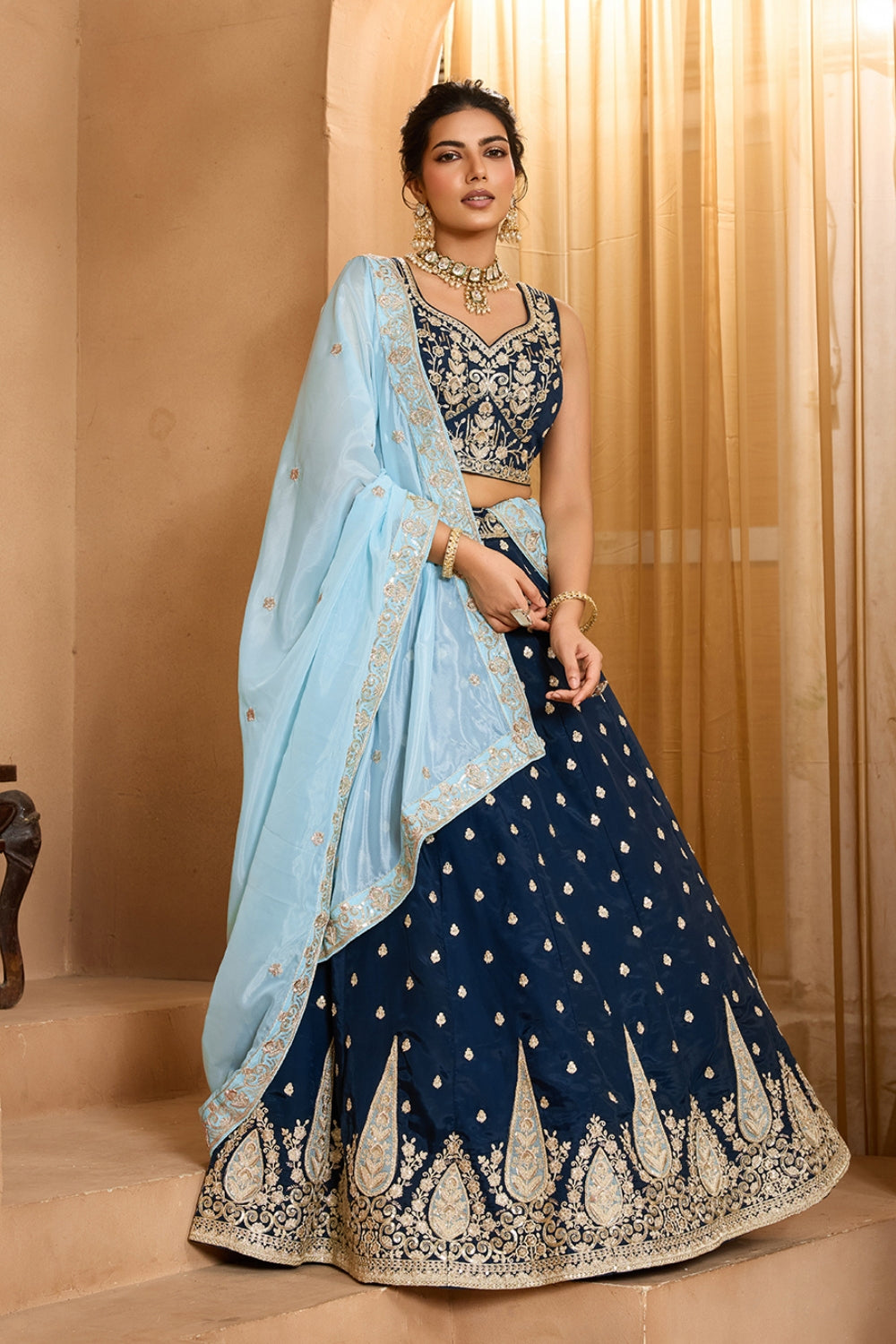 ORGANZA LEHENGA CHOLI WITH SEQUINS AND EMBROIDERY