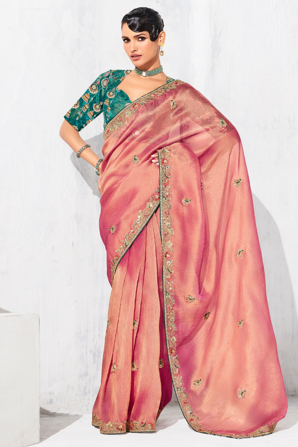 PEACH SAREE WITH SEQUINS AND EMBROIDERY