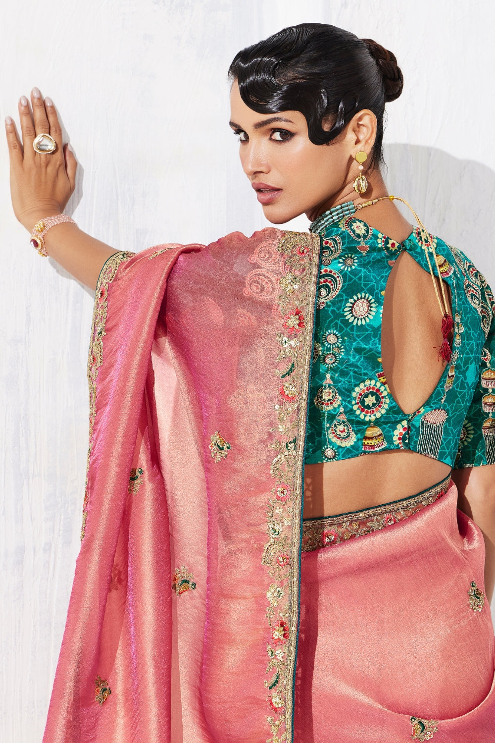 PEACH SAREE WITH SEQUINS AND EMBROIDERY