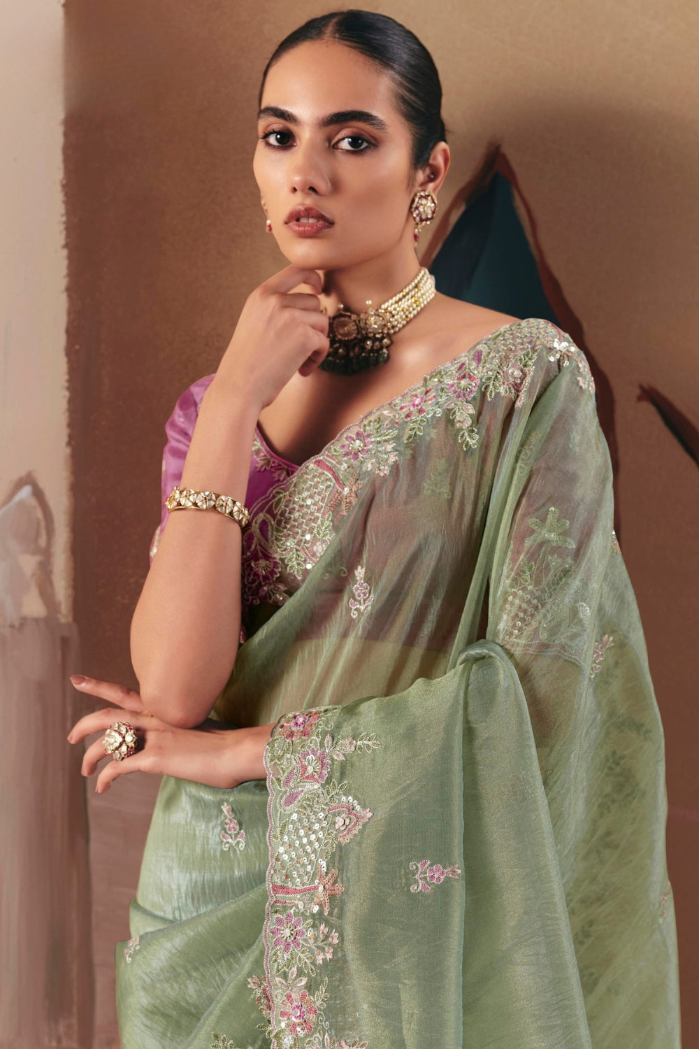 PISTA GREEN TISSUE SAREE WITH RESHAM EMBROIDERY AND MOTI