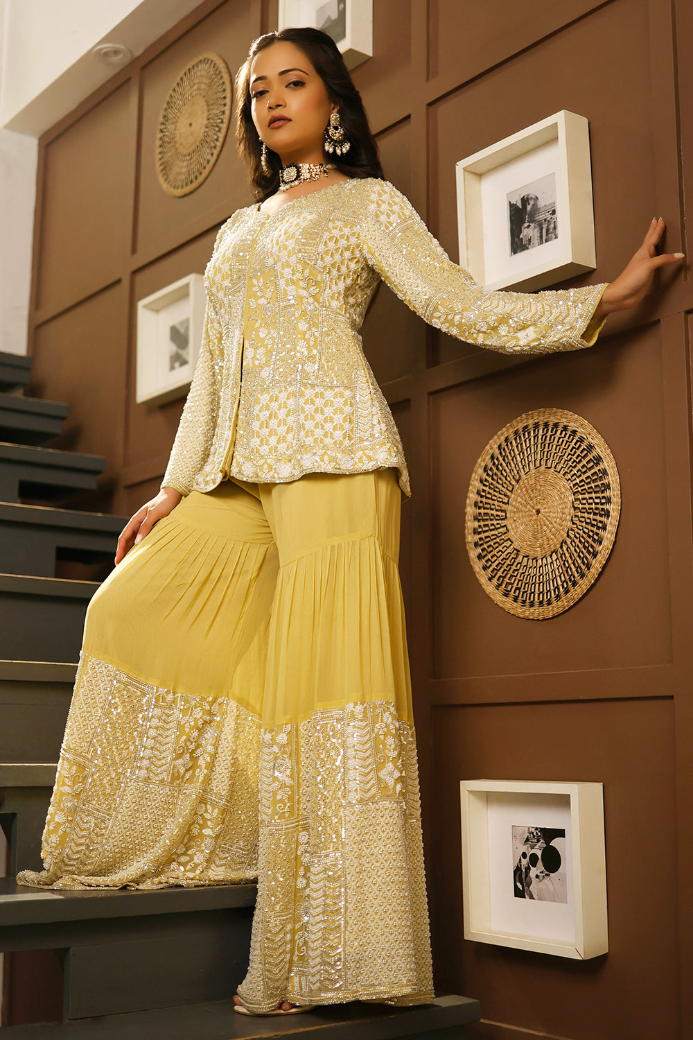 Pastel lime peplum sharara set adorned with intricate ivory sequin patchwork embroidery.