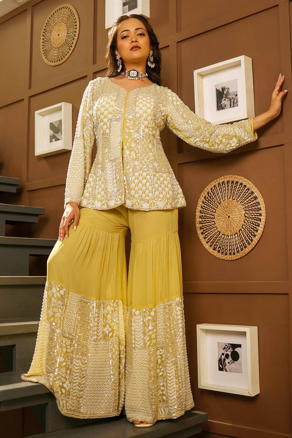 Pastel lime peplum sharara set adorned with intricate ivory sequin patchwork embroidery.