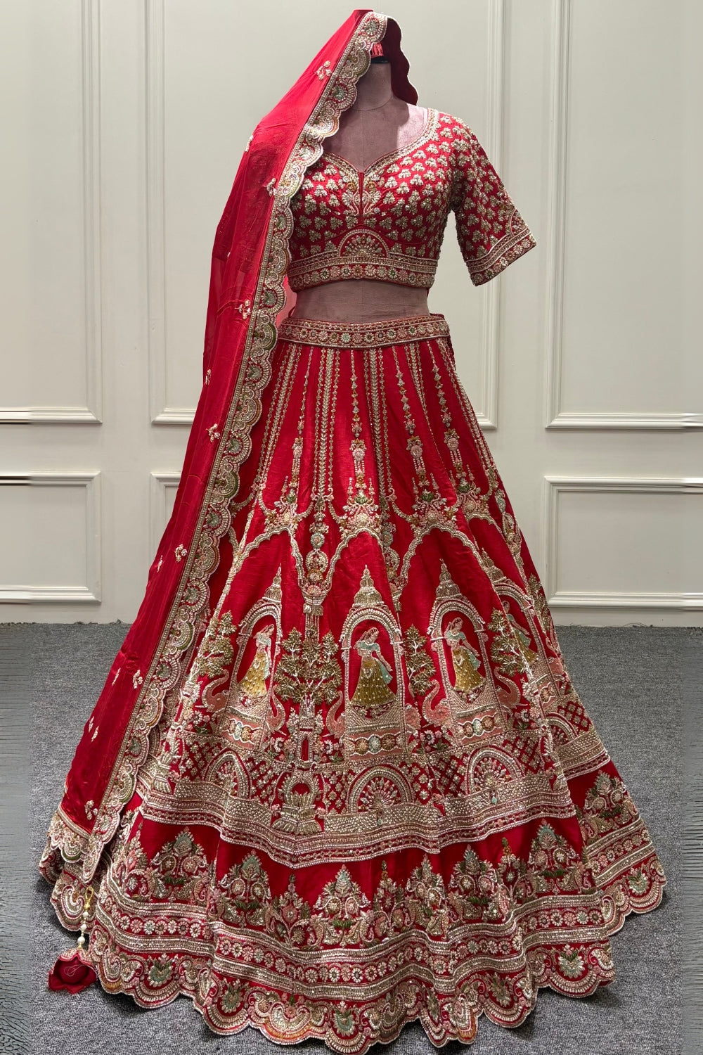 RED SILK BRIDAL LEHENGA SET WITH CUTDANA AND MOTI WORK