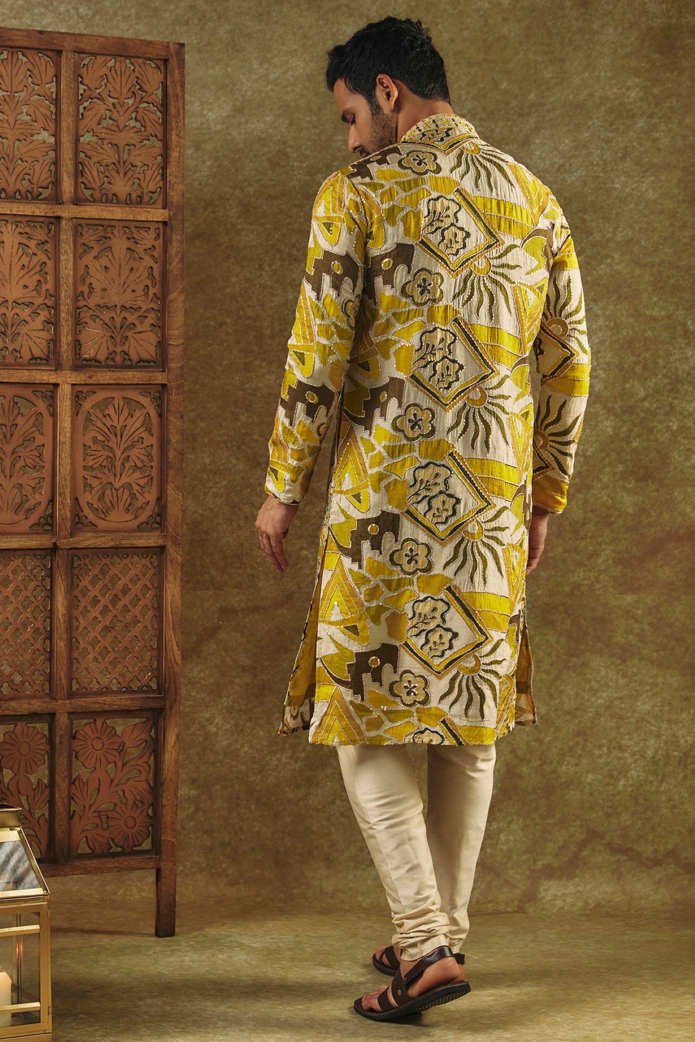 Mustard Yellow Printed Silk kurta pajama set with resham embroidered neck