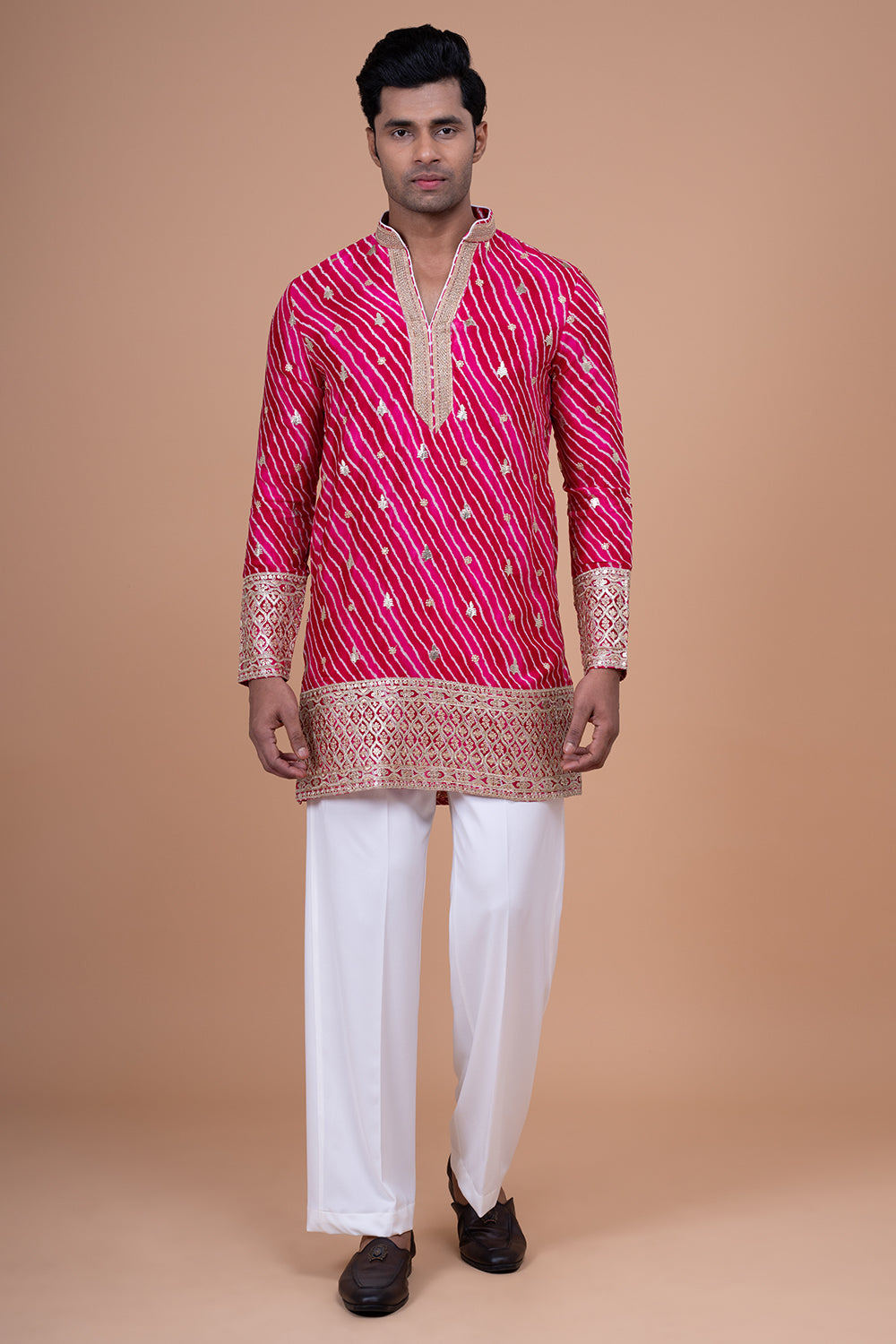 Rani Pink Leheriya Kurta with Heavy Gota Patti and Sequin Border.