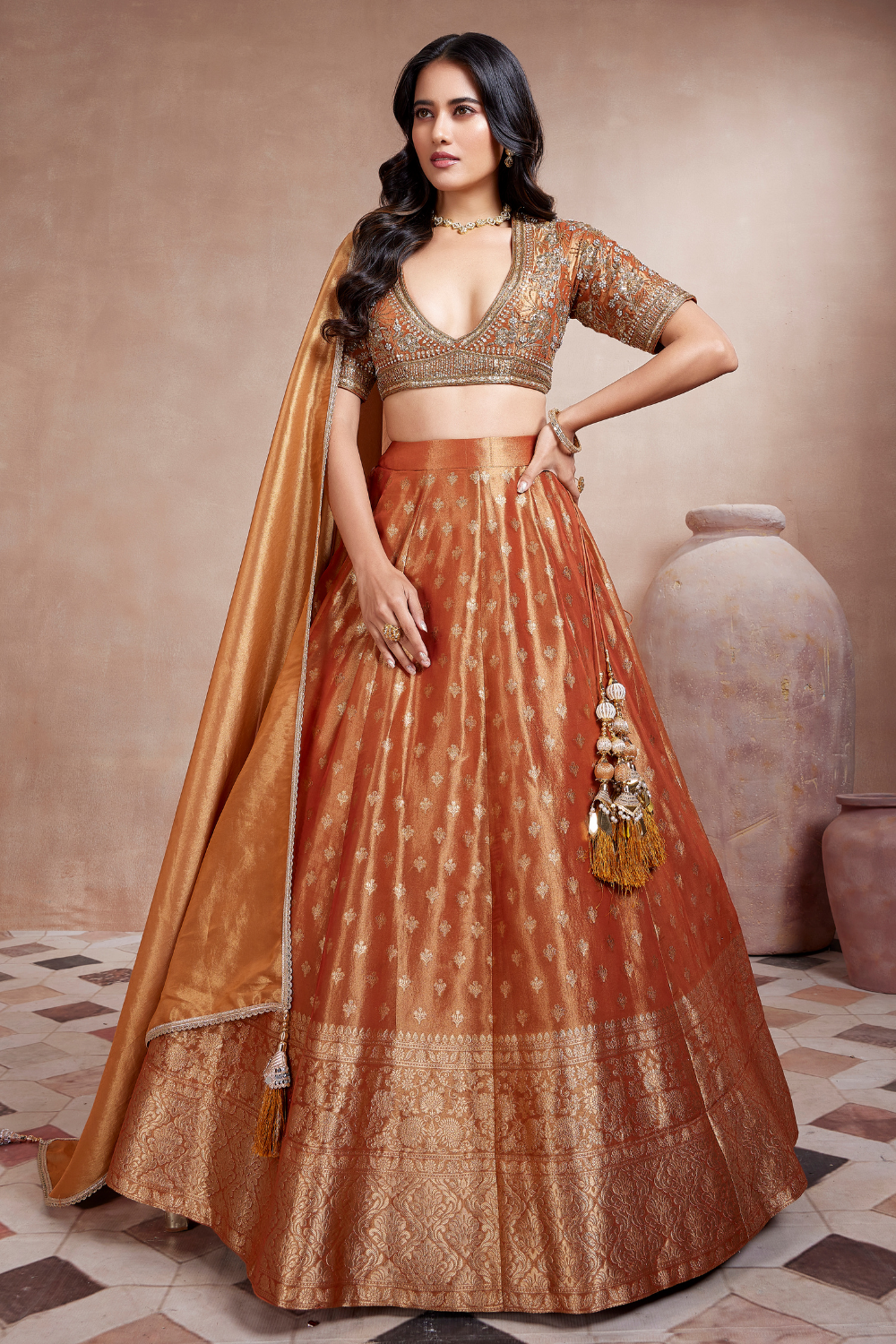 Rust Orange Tissue Lehenga Choli With Zari Weaving