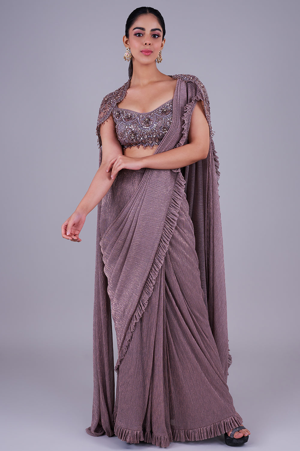 Taupe shimmer saree with embellished blouse & cape