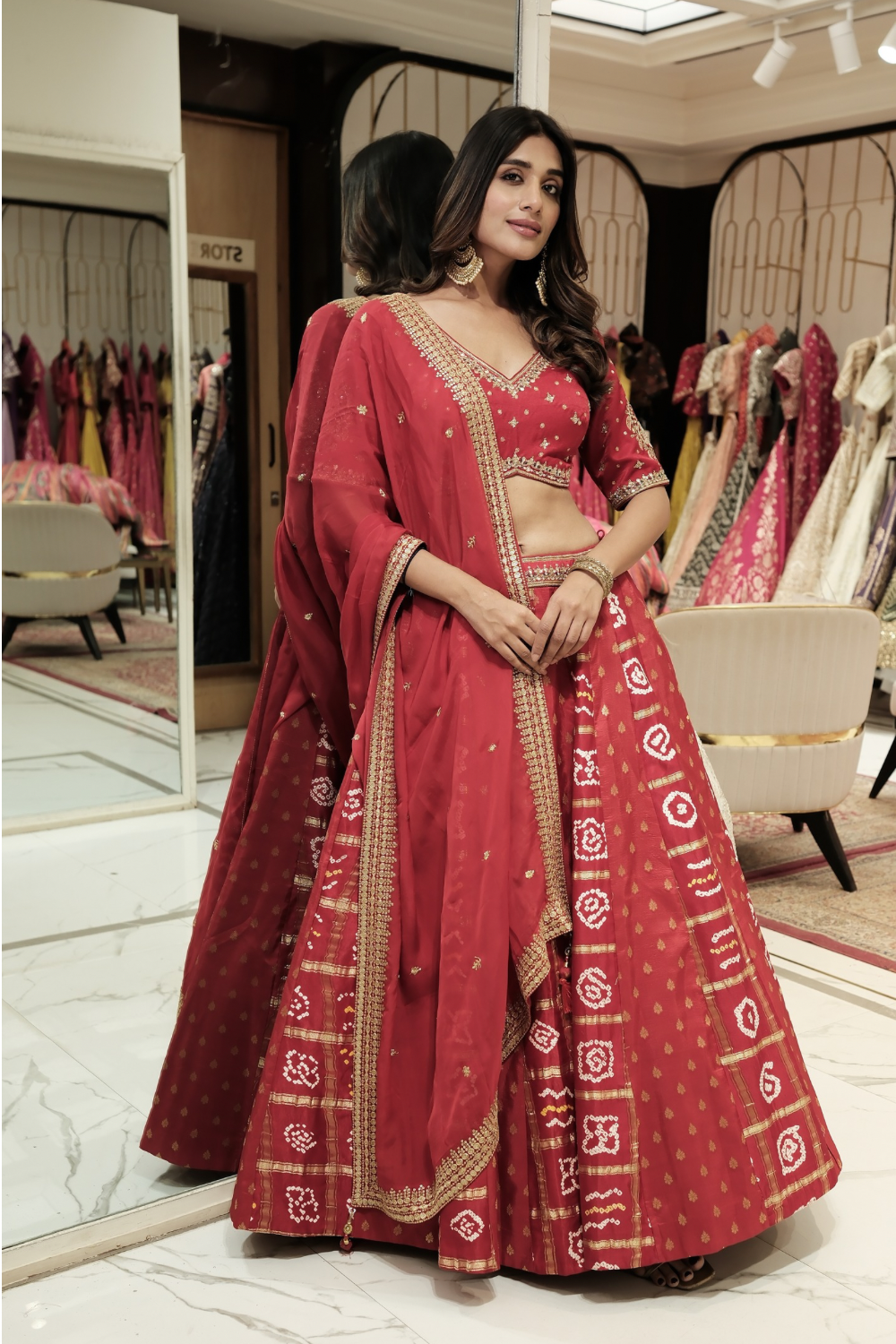 Red silk lehenga choli with mirror and pearl work